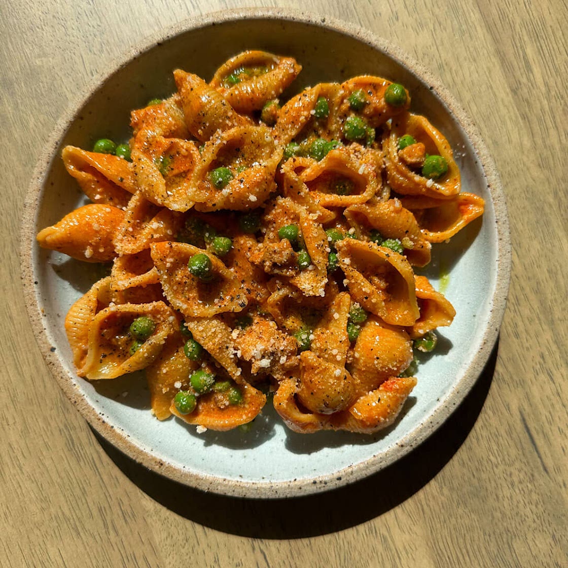 Spicy Goat Cheese Pasta with Sausage and Peas