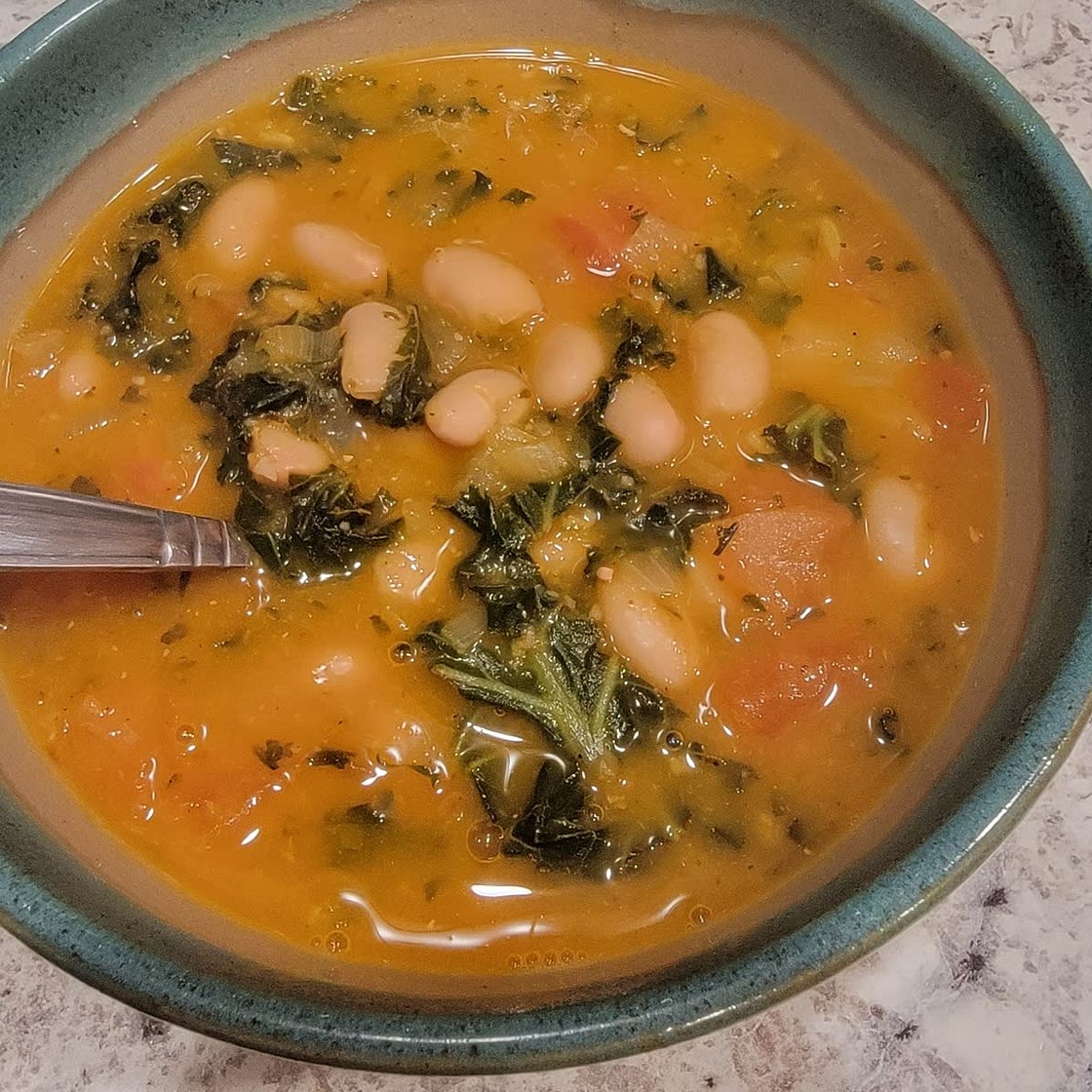 White Bean and Kale Soup with Parmesan Cheese