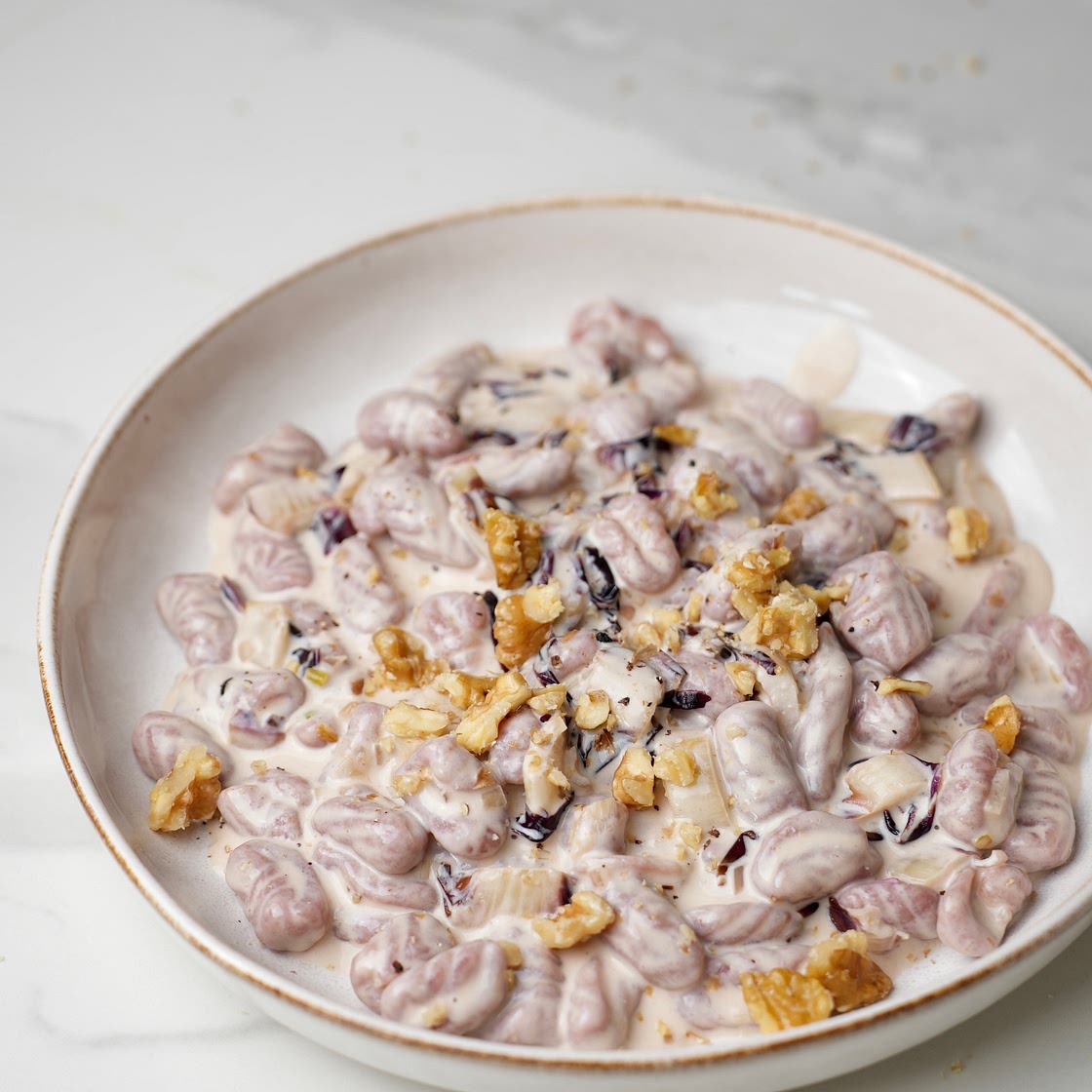 Beetroot cavatelli with radicchio and Provola cheese