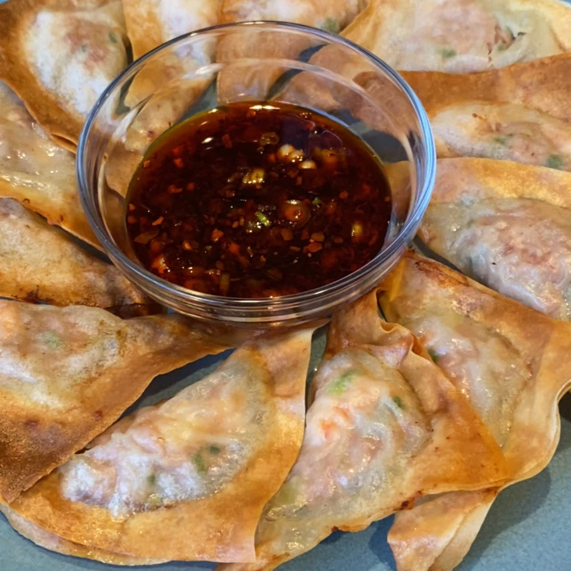 Crispy air fryer dumplings with chili oil sauce 