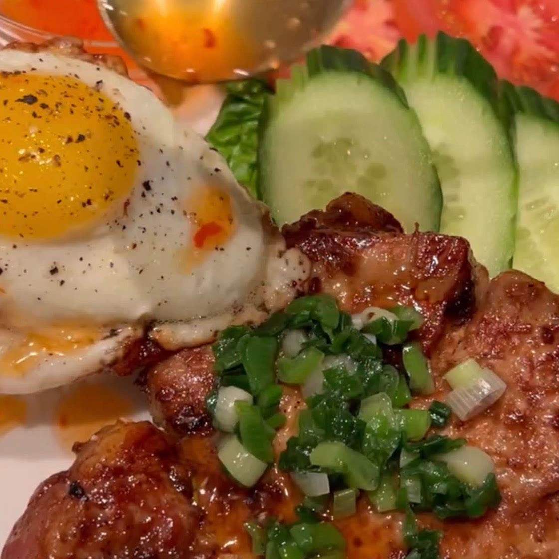 Lemongrass Pork Chops with a fried egg 