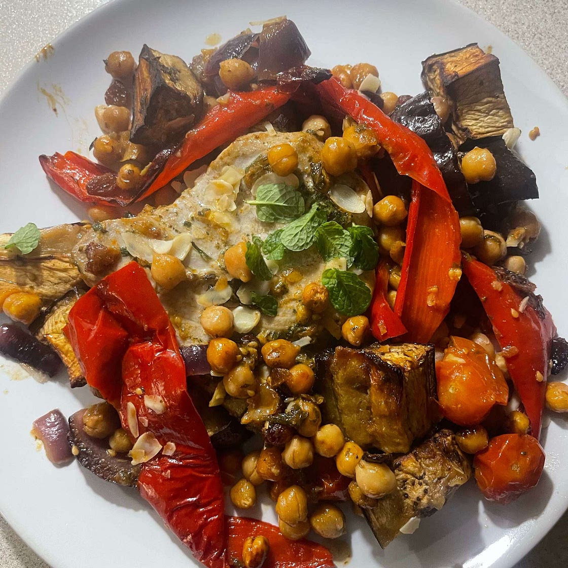 Chermoula roasted tuna, peppers, chickpeas and raisins recipe