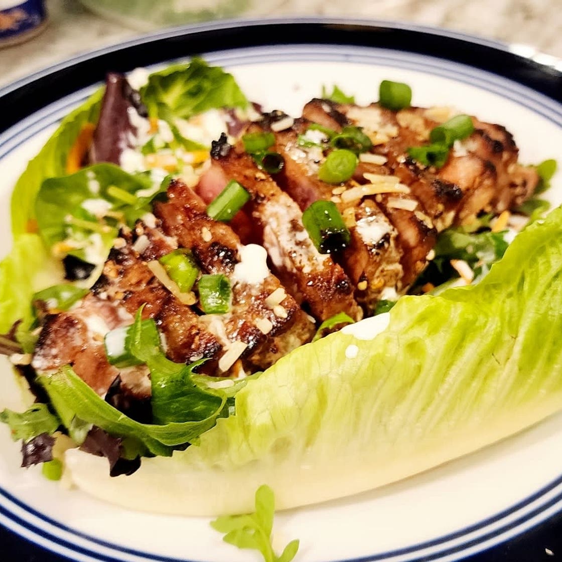 Ahi Tuna Sesame-Crusted steak with creamy dressing and Salad