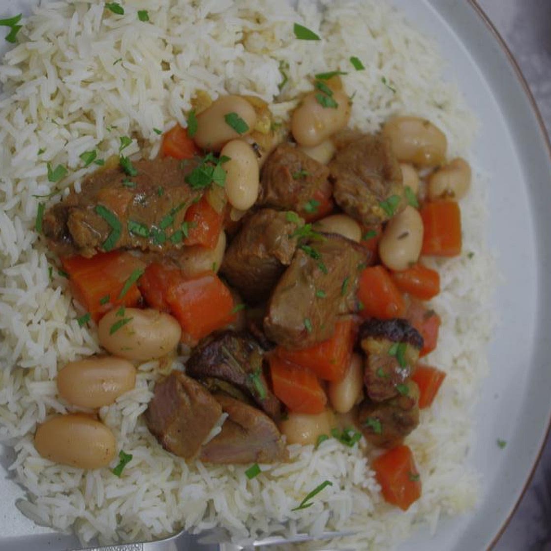 Braised lamb with butter beans and carrots