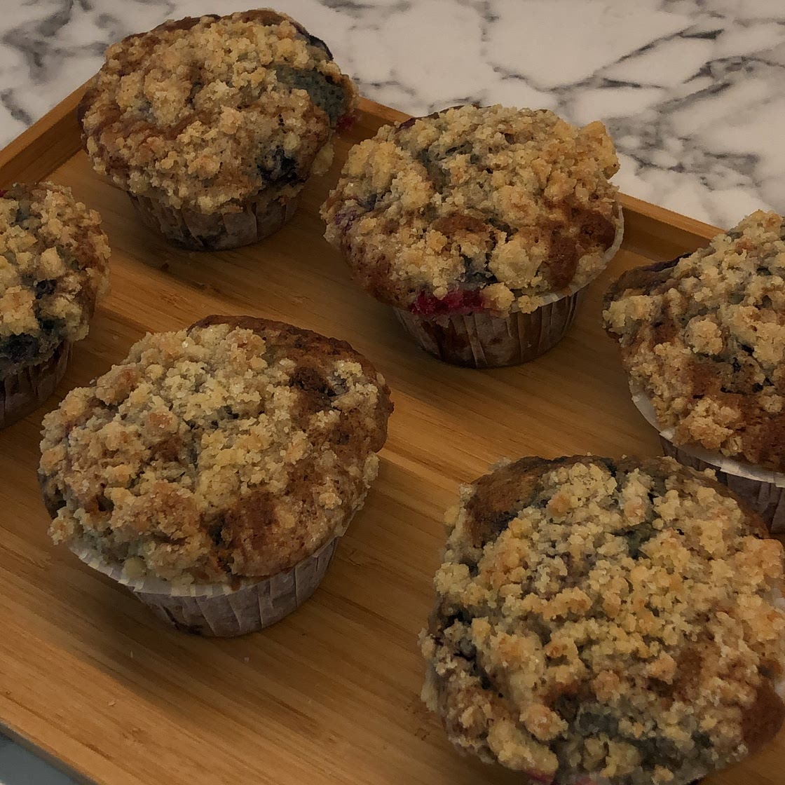 Blueberry crumble bakery style muffin