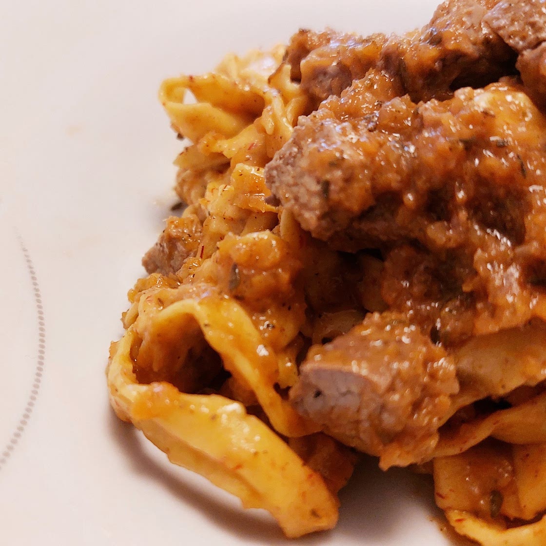 Handmade saffron tagliatelle - Lamb sauce