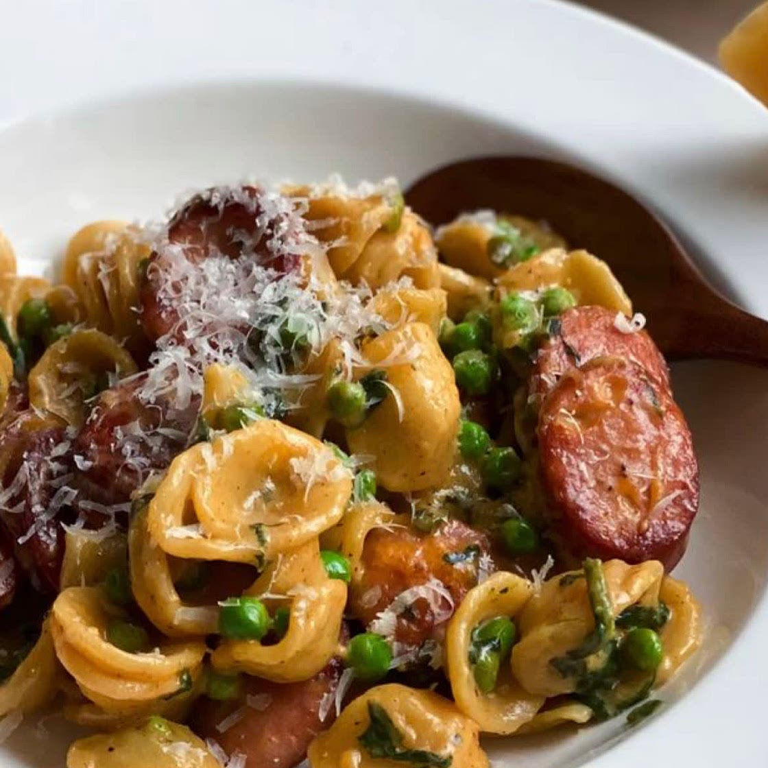 Creamy orecchiette with sausage and peas