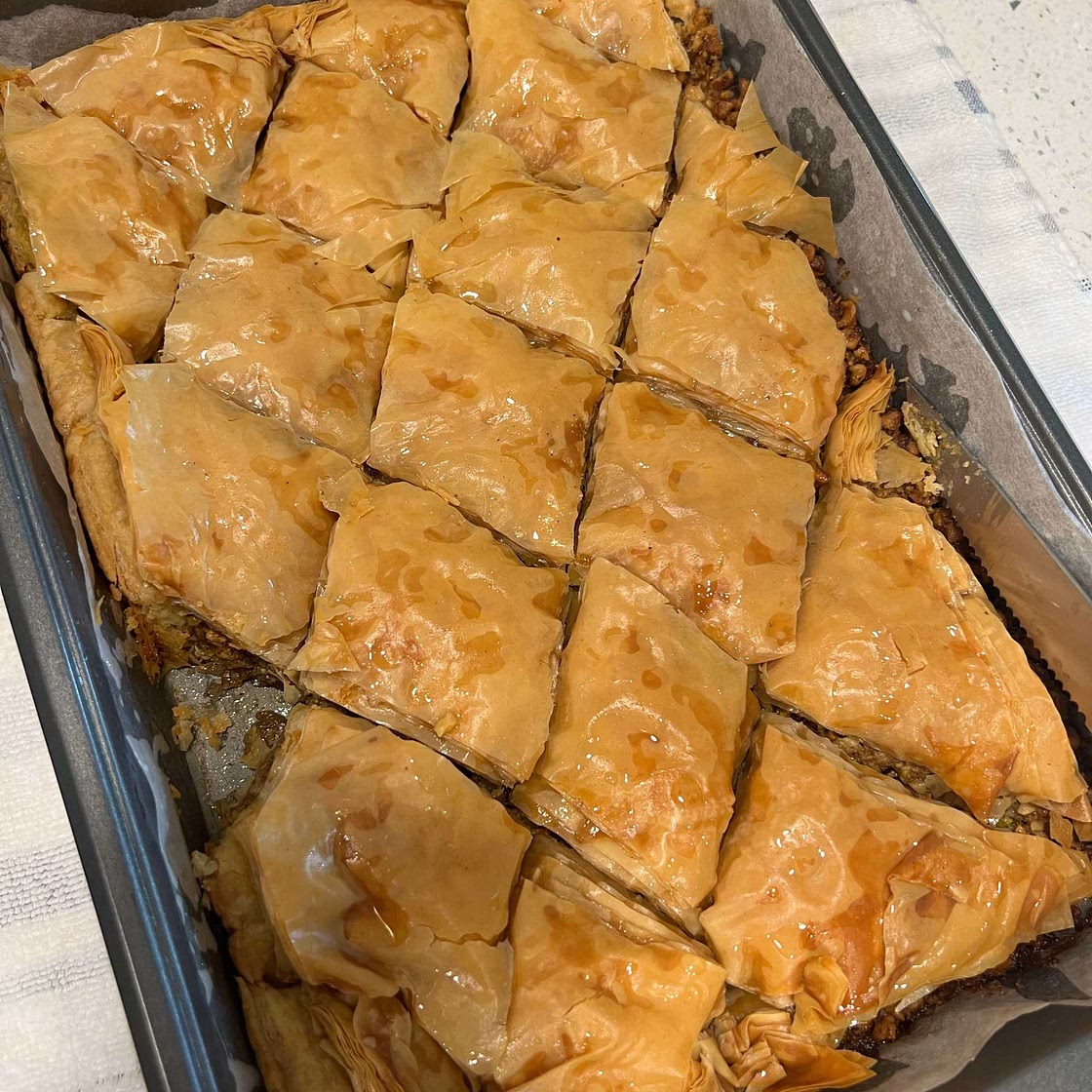 Easy baklava hack for making it at home in less time and effort! 🙌 INGREDIENTS 1 pound box of phyllo 9"x14" sheets, room temperature ¾ cup clarified butter or ghee *For the Simple Syrup 1 cup granulated sugar ¾ cup water 1 tablespoon lemon juice 1 tablesp