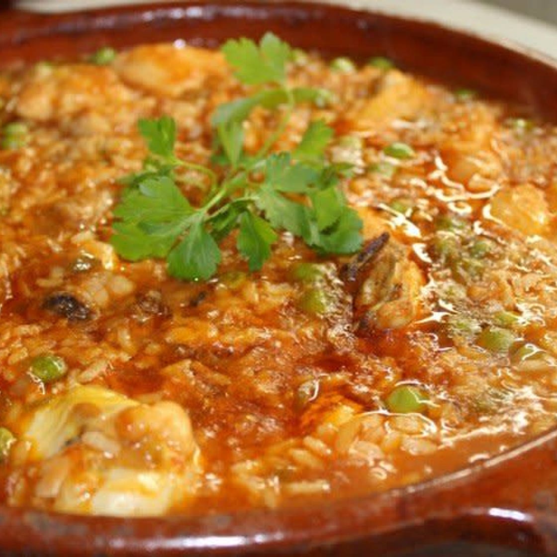Arroz meloso de pollo y pimientos