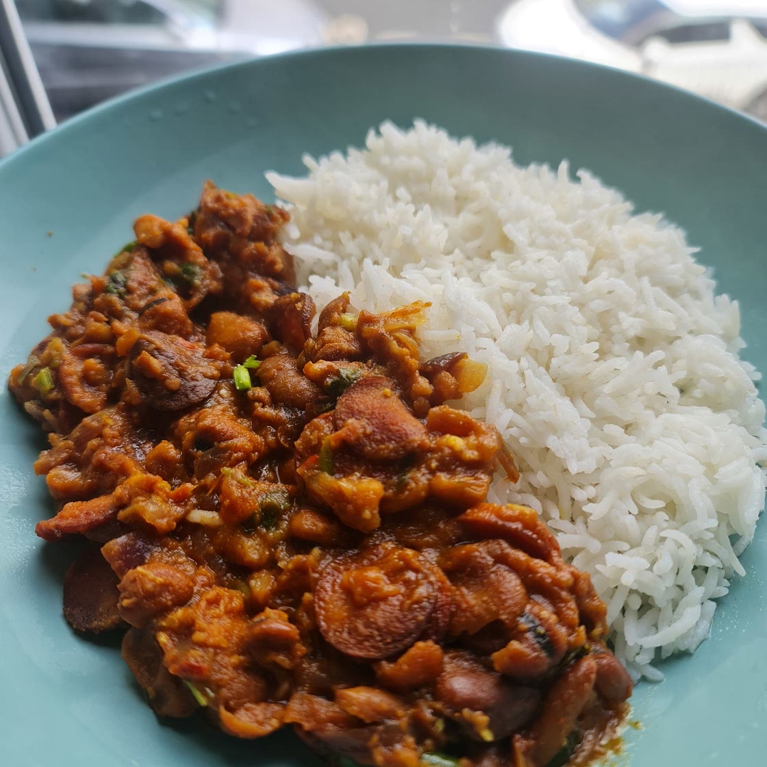 Fava beans and sausages with rice.