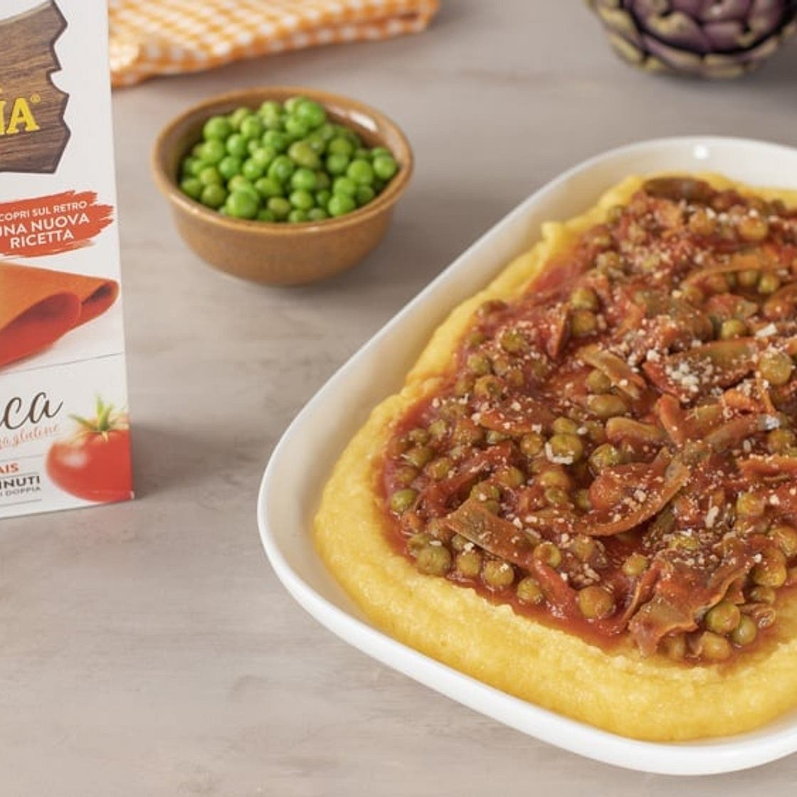 POLENTA AL SUGO DI CARCIOFI E PISELLI