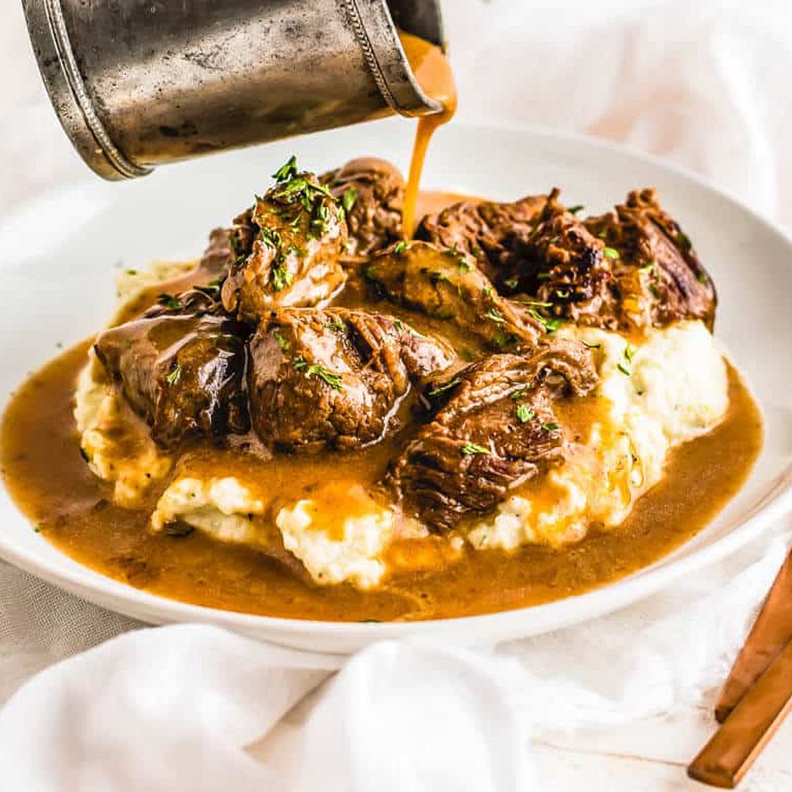 Beef Tips & Gravy over Cauliflower Mash