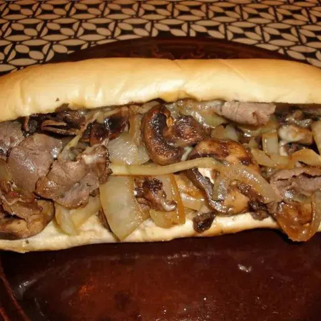 SLOW COOKER PHILLY CHEESE STEAK SANDWICHES