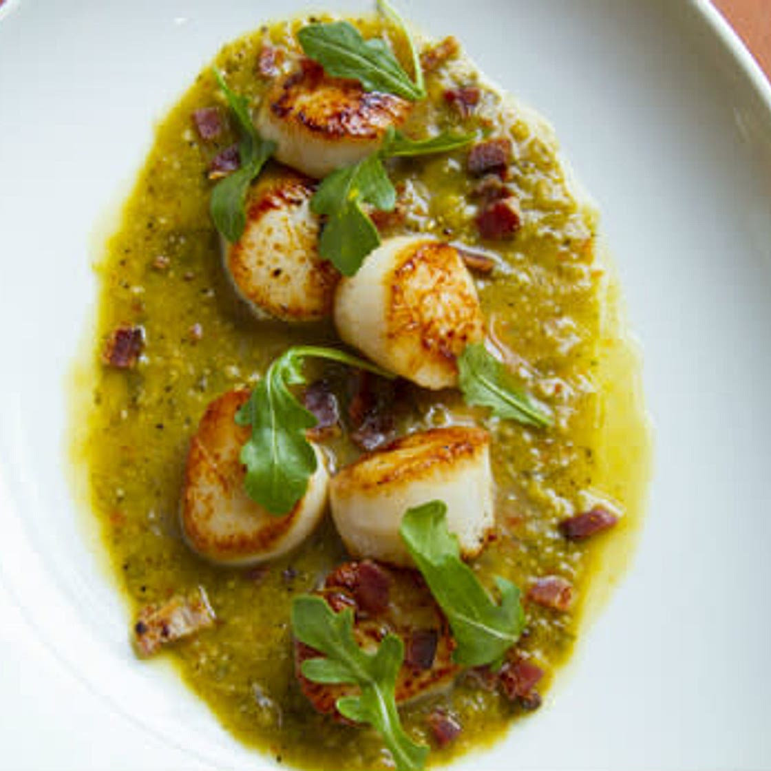 Seared Sea Scallops With Roasted Tomatillos and Green Olives