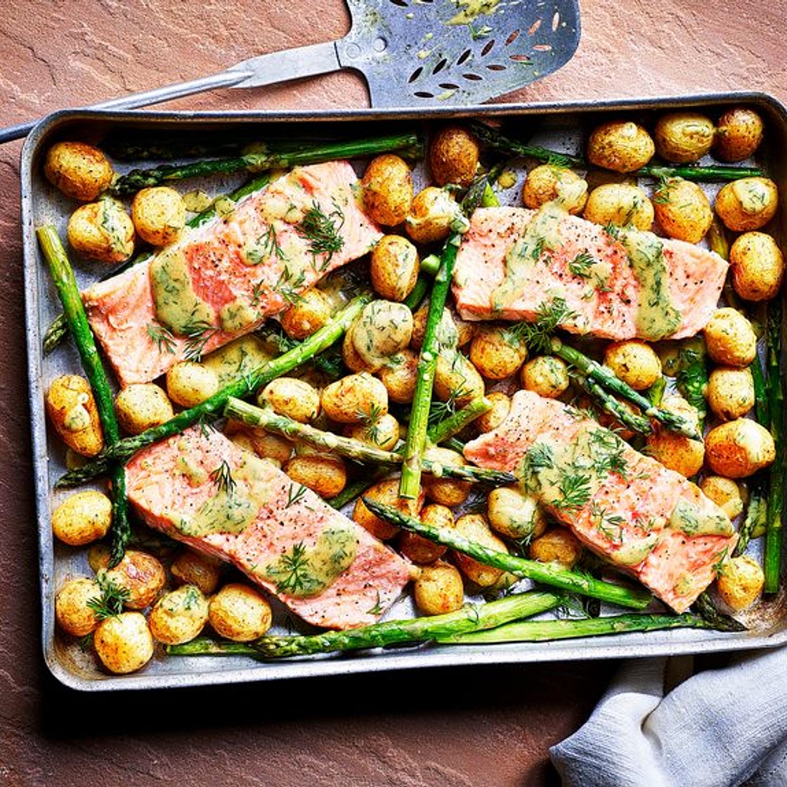 Sea trout, new potato and asparagus traybake with dill mustard sauce