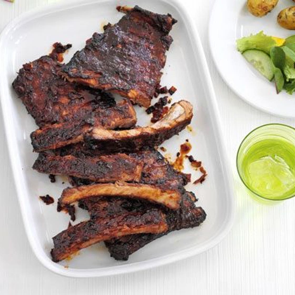 Sticky ribs with roast potato salad