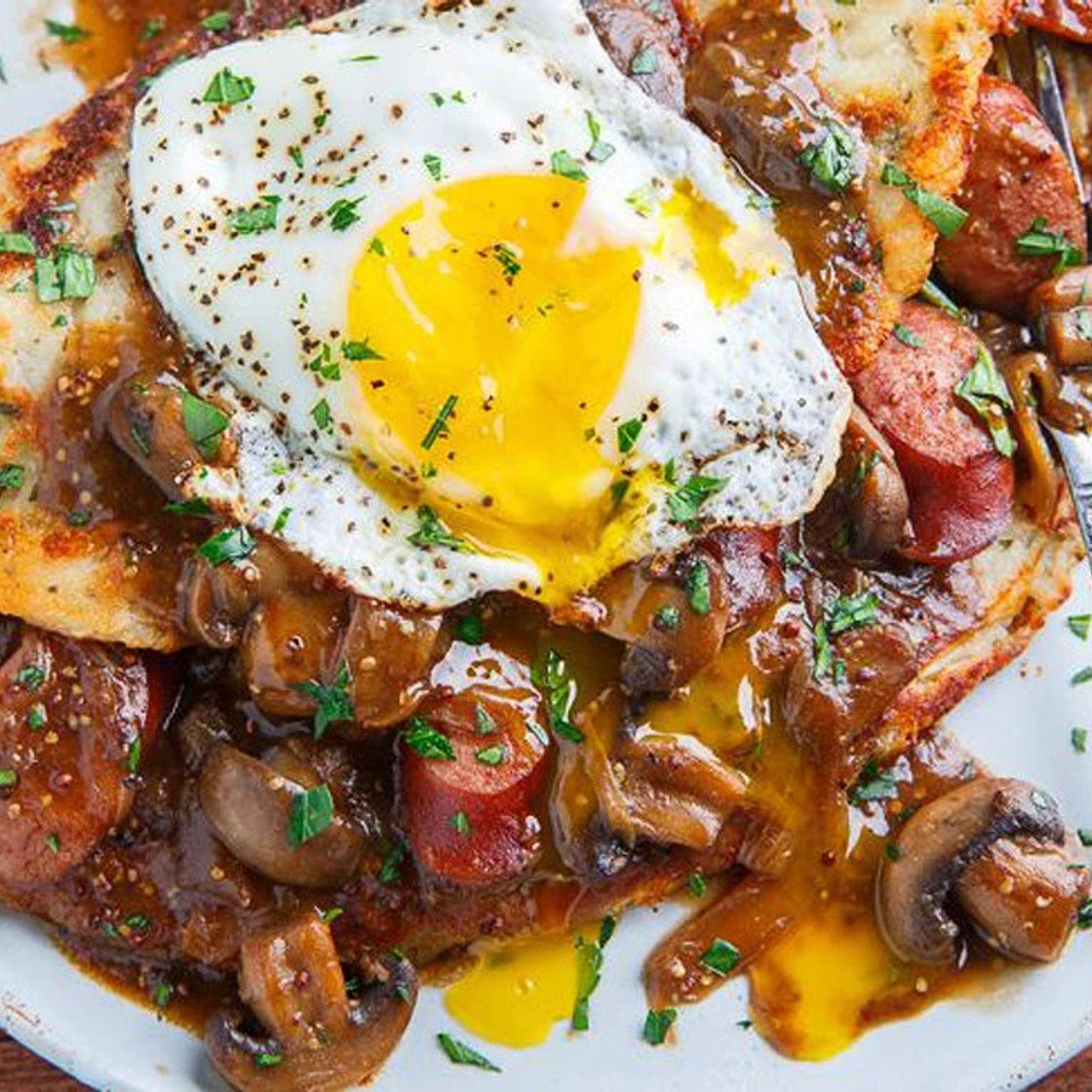 Boxty (Irish Potato Pancakes) With Bangers In A Guinness Mushroom And Onion Gravy