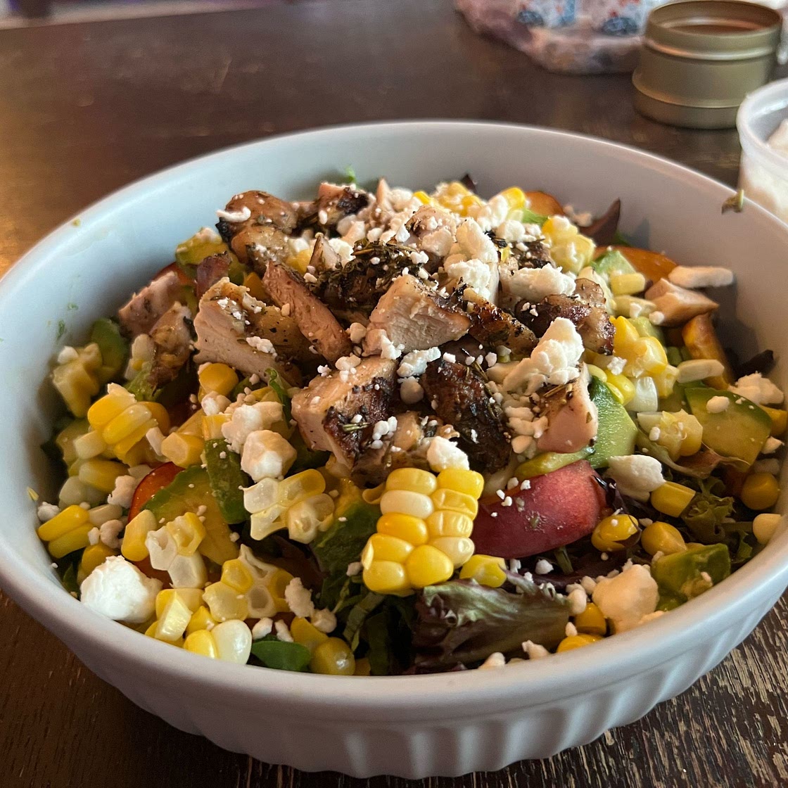 Rosemary Chicken, Caramelized Corn, and Peach Salad with Hot Bacon Vinaigrette