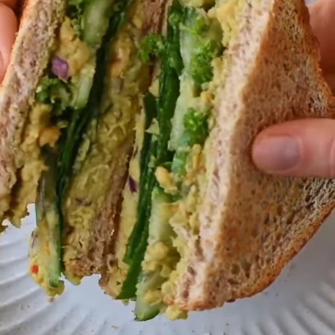 Smashed avocado chickpea cucumber sandwich