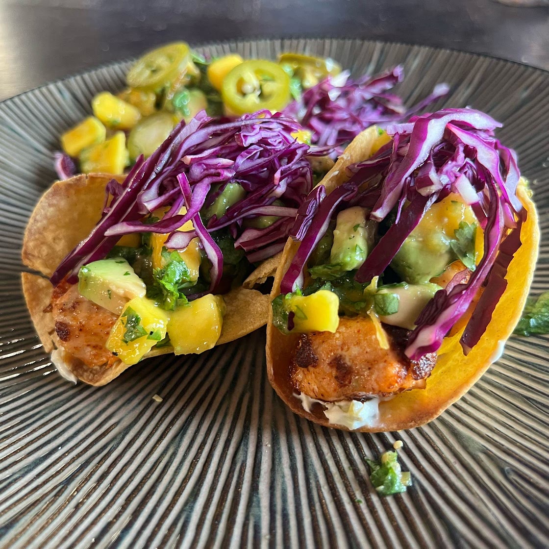Crispy BBQ Salmon Tacos with Avocado Mango Salsa and Jalapeño Cream