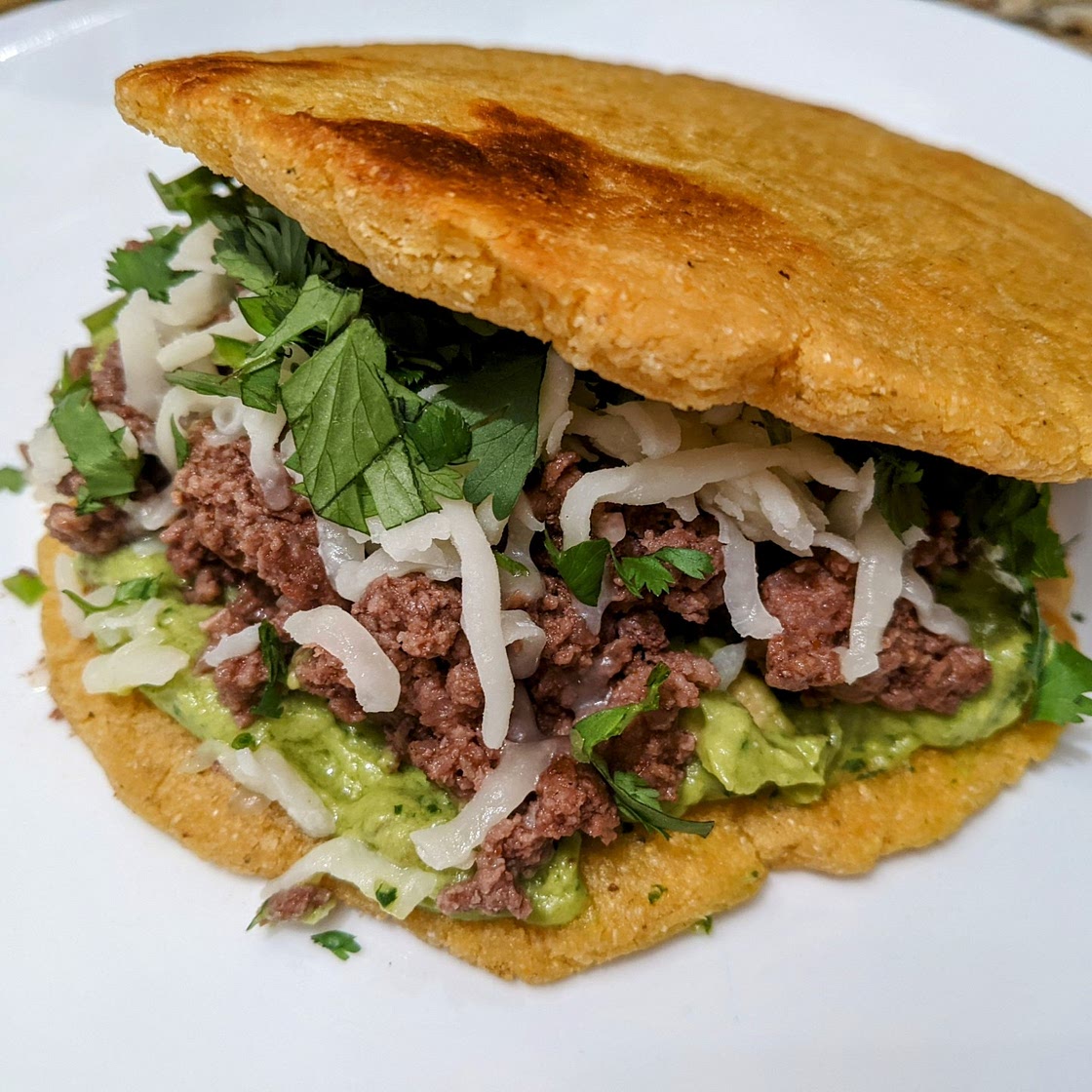Ground Beef and Avocado Crema Arepas