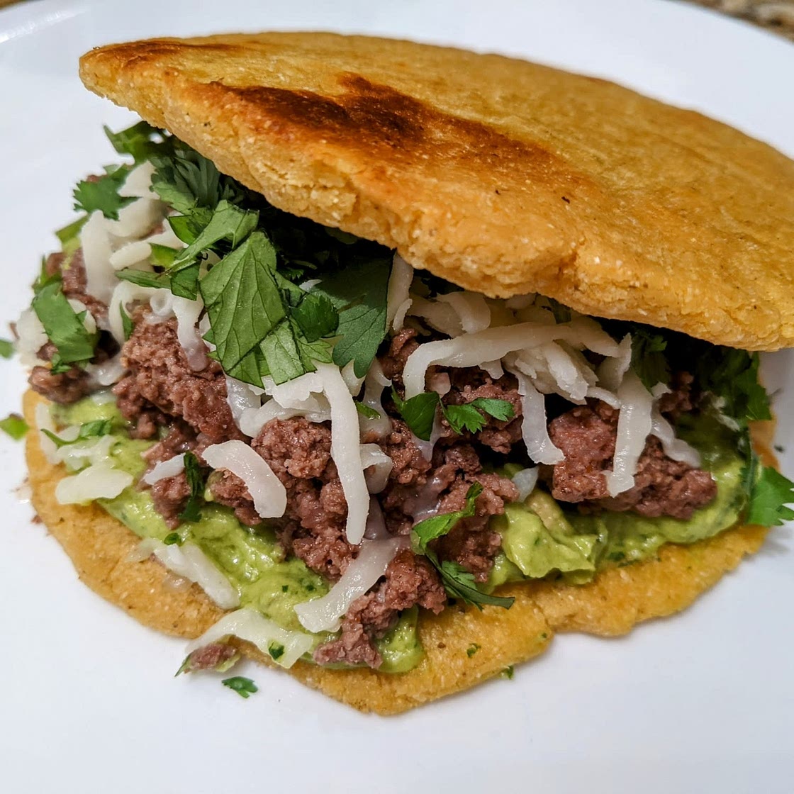 Ground Beef and Avocado Crema Arepas