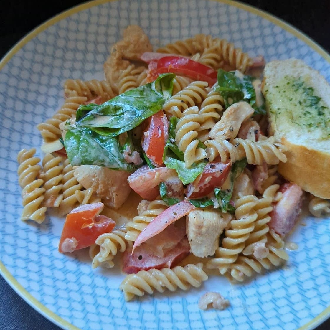 Chicken and Bacon Pasta with Spinach and Tomatoes in Garlic Cream Sauce