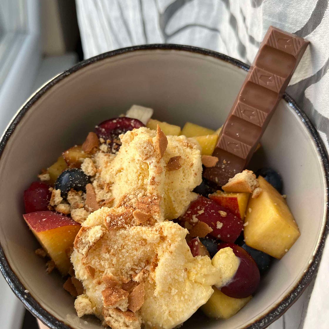 A perfect dessert - fruit salad with ice-cream