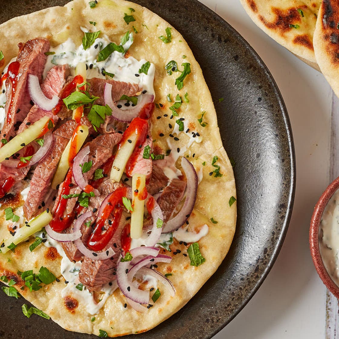 Lamb flatbreads with pickled cucumber and elderflower yoghurt