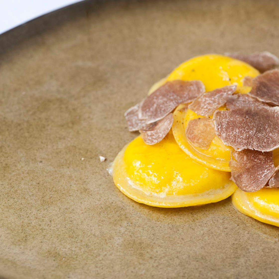 Egg yolk ravioli with truffle and Parmesan
