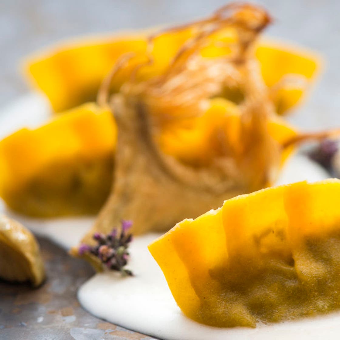Mezzelune ravioli with artichokes, pecorino and thyme