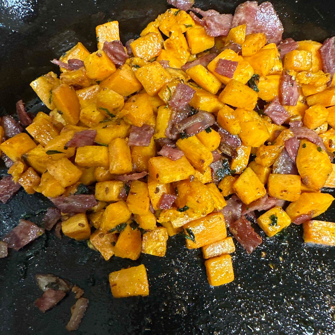 Sweet potato-bacon hash with avocado cream