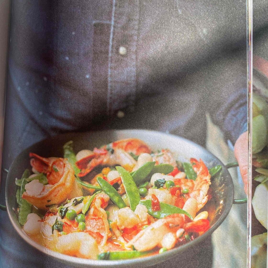 Pan cooked giant prawns with mangetouts, peas and butter beans 