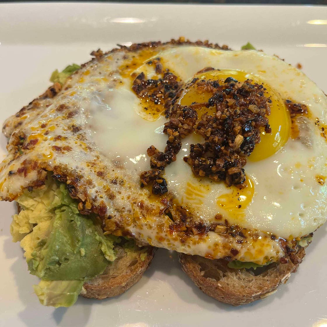 Avocado toast with chili-oil egg