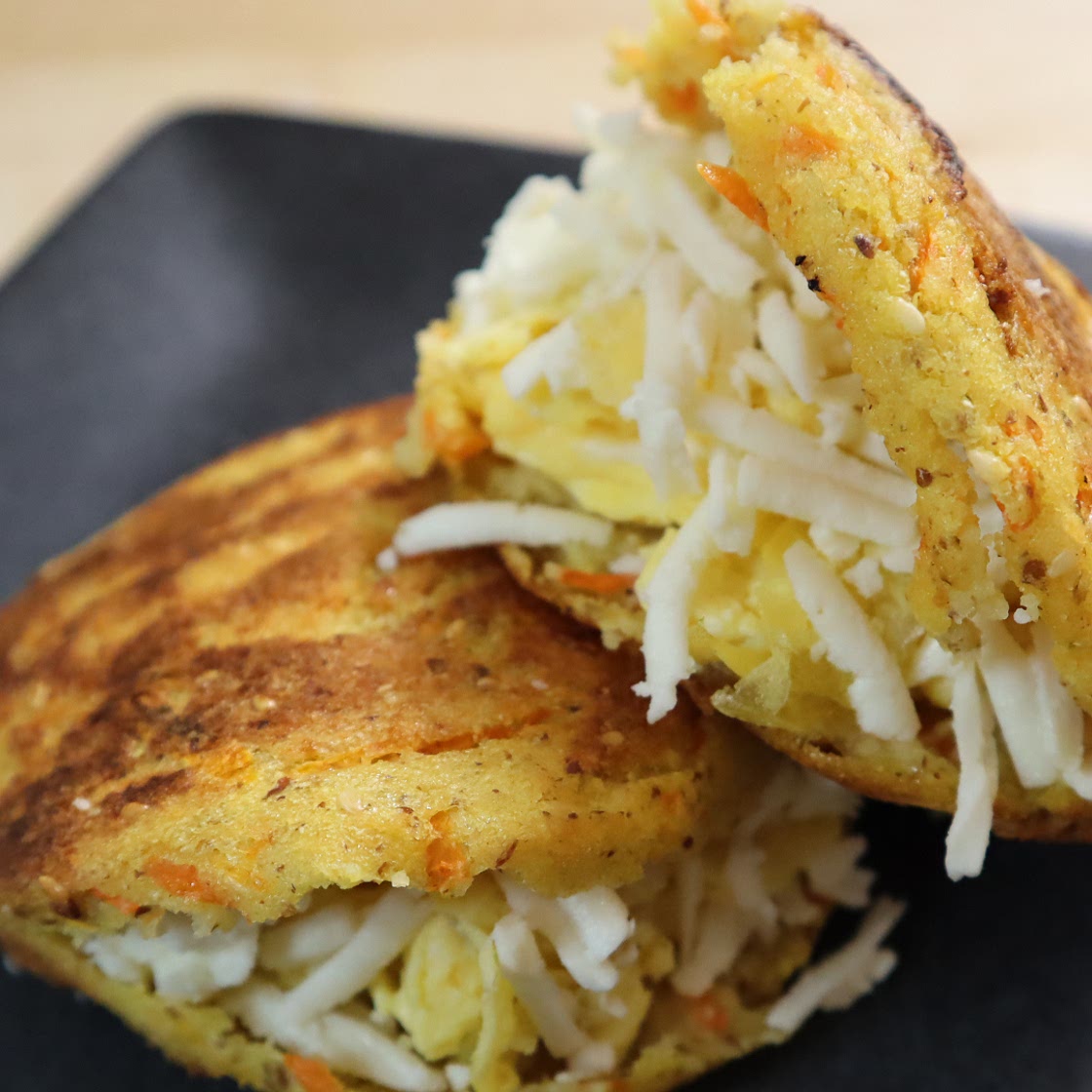 Arepas with carrots, eggs and cheese.