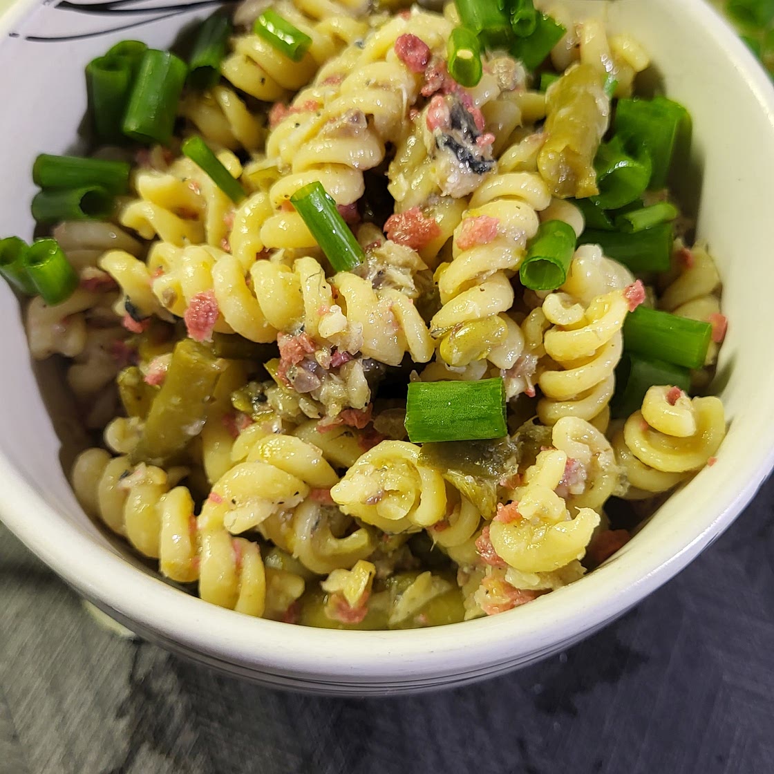 Sardine pasta salad with bacon bits and green beans