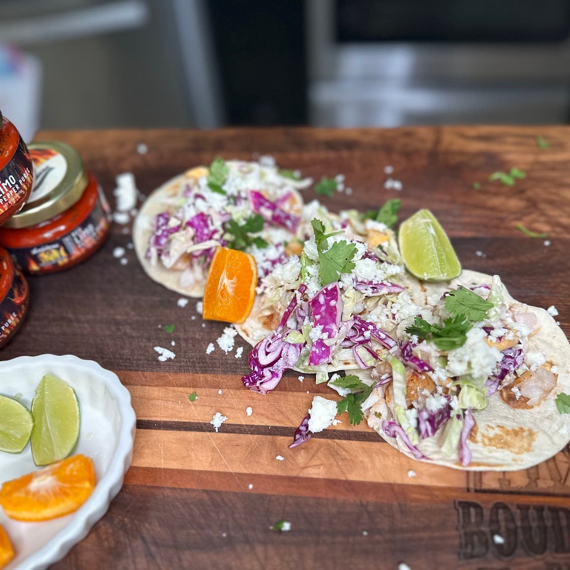 FISH TACOS WITH MANGO-CITRUS SLAW