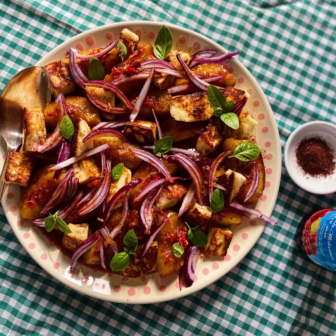 Warm nectarine and halloumi salad with basil and sumac