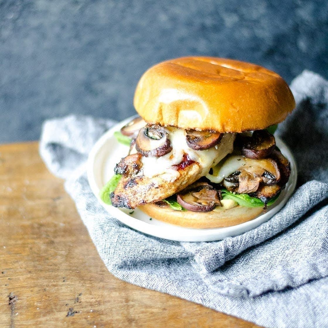 Spiced chicken sandwiches with mushrooms and swiss