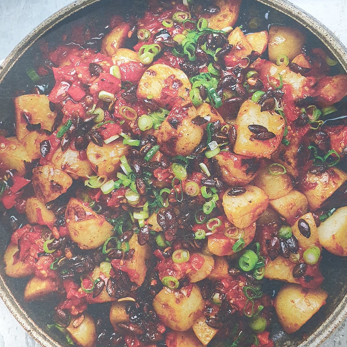 Potato salad with charred tomato and orange salsa