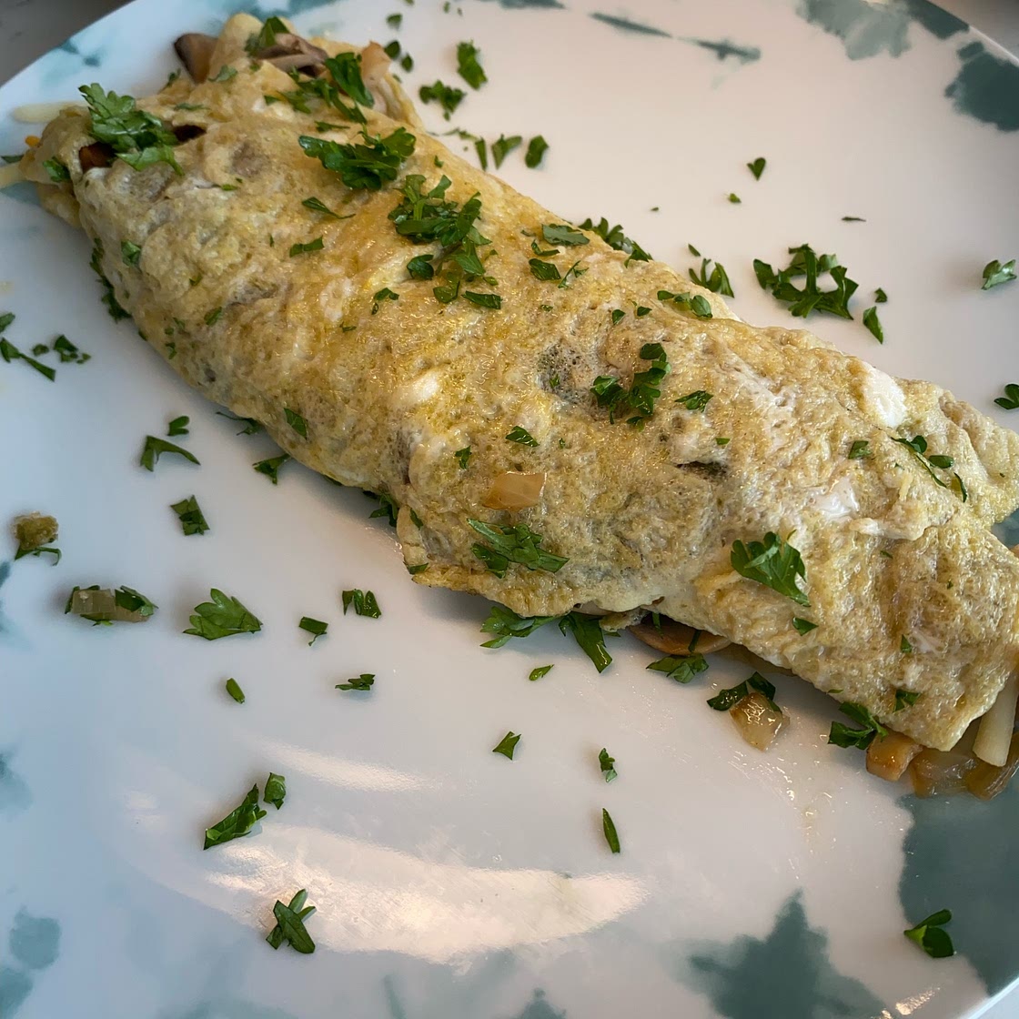 Spinach Omelette with a side of yogurt and granola