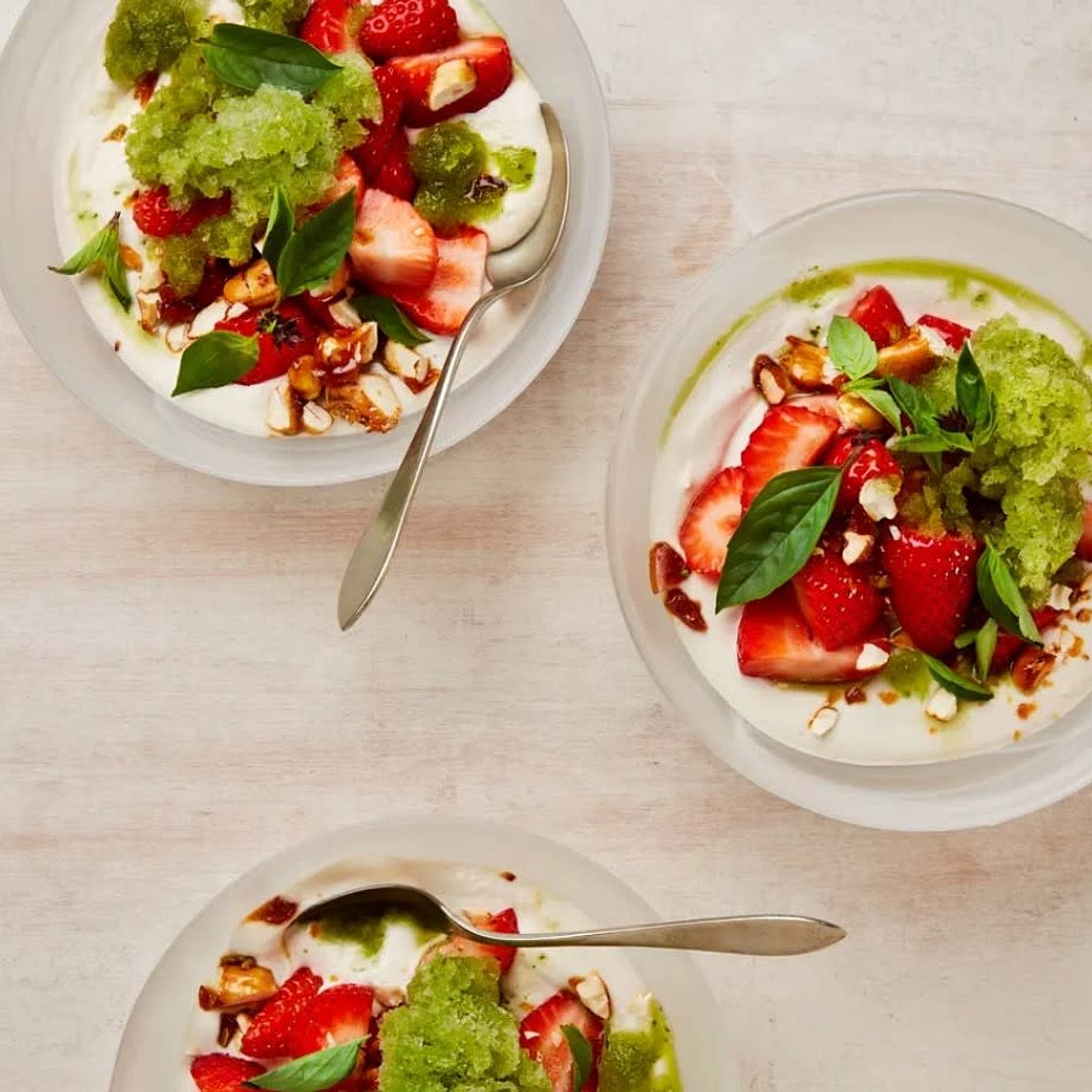 Strawberries with cashew cream and Thai basil granita