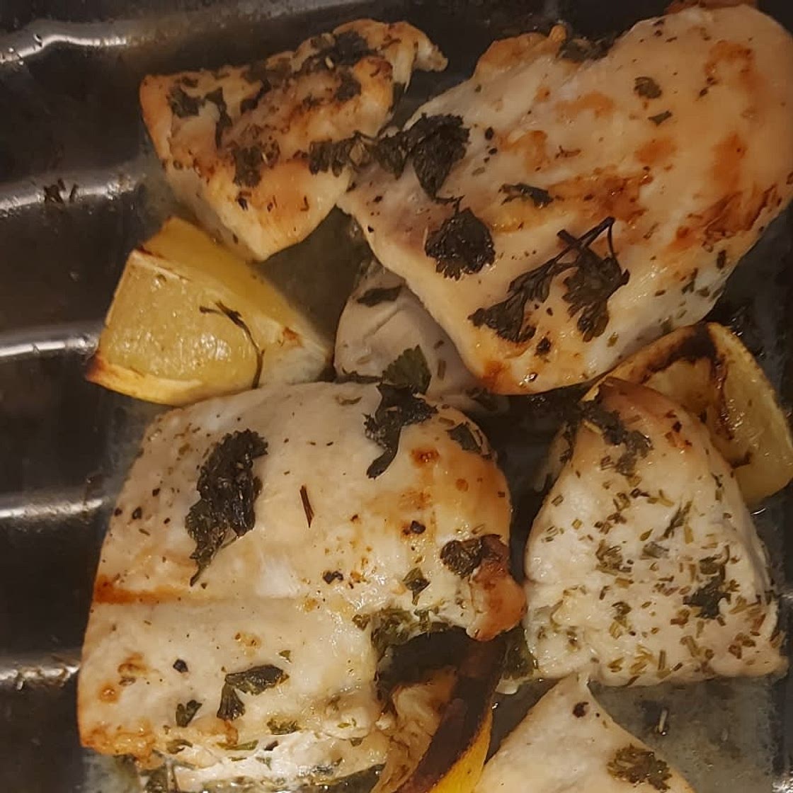 Baked chicken with lemon and fresh herbs