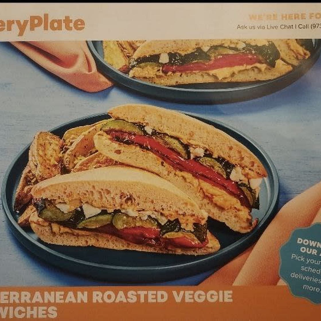 Mediterranean Roasted Veggie Sandwiches with feta, creamy hummus sauce, and lemon herb potato wedges
