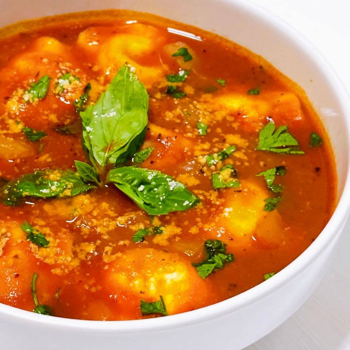 Four Cheese Ravioli in Tomato Broth