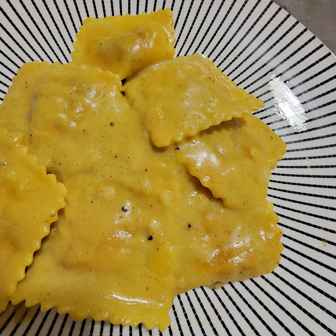 Butternut squash ravioli with a sage brown sugar butter cream sauce