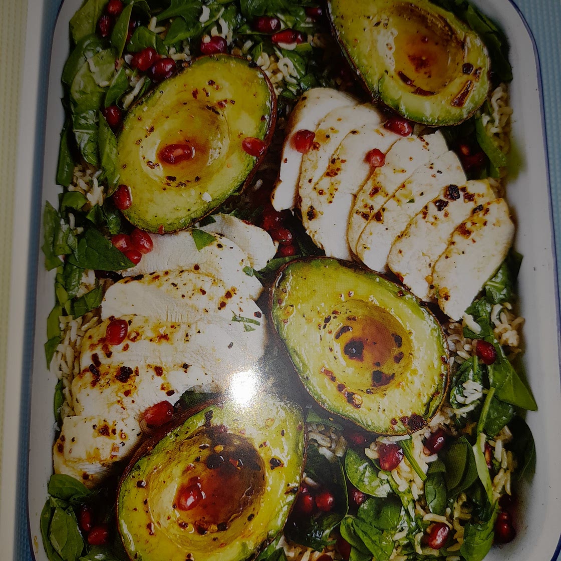 Avocado and chicken salad with pomegranates and brown rice