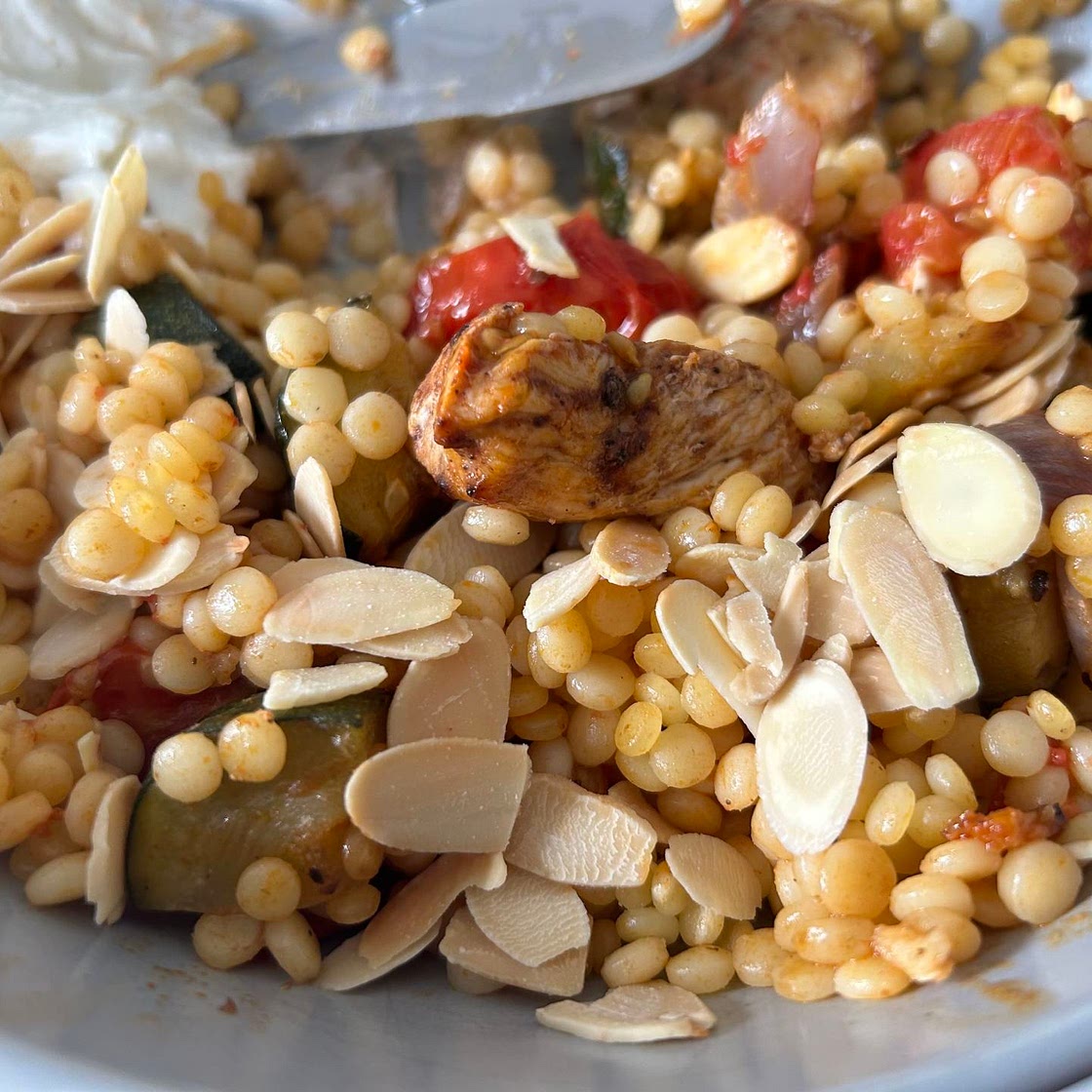Honey & harissa chicken with giant couscous