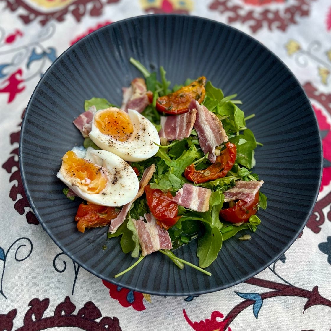 Bacon and Sun Blushed Tomatoes on a Rocket, Parsley and Chive Sa
