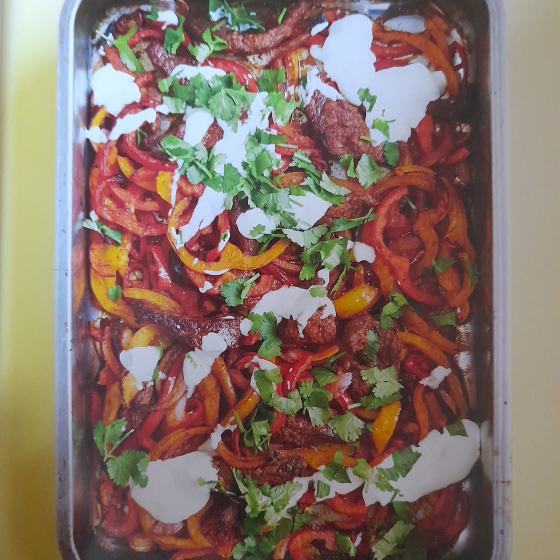 Flash-grilled spiced steak with peppers, chillies and onions